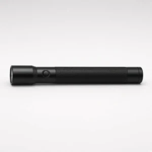 Black Maglite ML25 3C LED duty torch, side view showing the push-button switch and knurled barrel